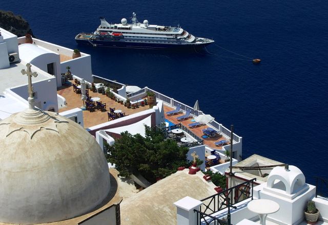 Cruise ship docked off Santorini.