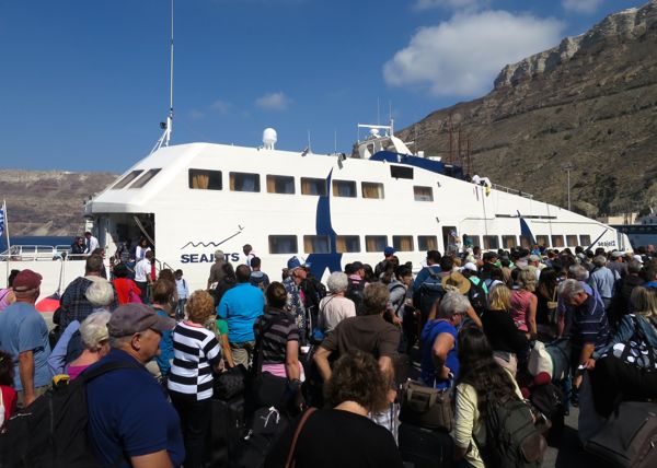 Boarding the SeaJet ferry in Santorini on its way to Mykonos.