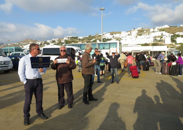 Hotel owners at the old Myknos ferry port near the Old Town.