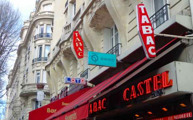TABAC sign for buying Metro and Bus tickets in Paris.
