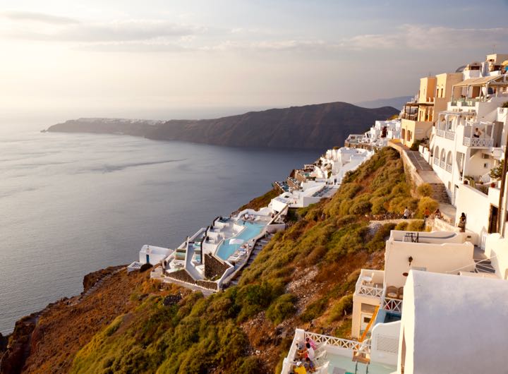 View of Santorini Grace swimming pool with caldera in background.