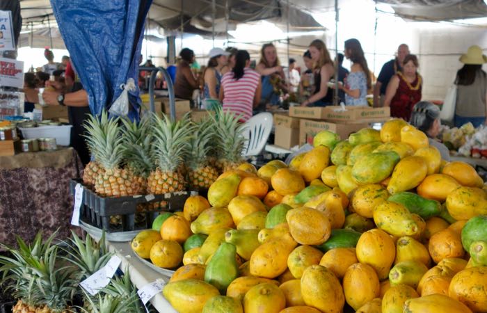 Large farmers market on Hawaii's Big Island with food, art, and flowers