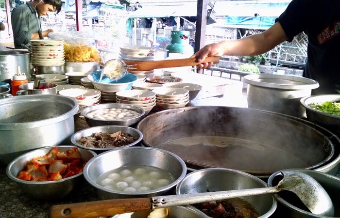 Find traditional Thai boat noodles near Bangkok's Victory Monument