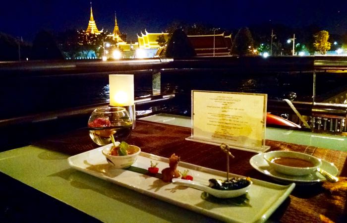 Take a dinner cruise down the Chao Phraya river in Bangkok.