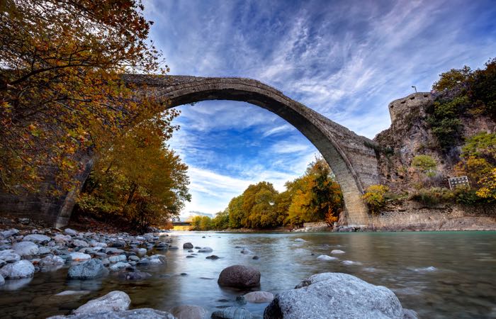 Traditional stone bridge in Konitsa village in northern Greece. This is a stunningly beautiful area.