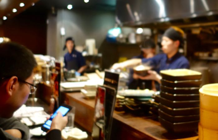Go out to an izakaya (Japanese informal pub) in Toronto.