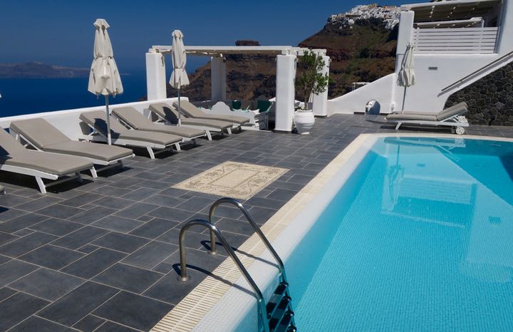 Santorini All Inclusive Resort with Pool and views of volcano.