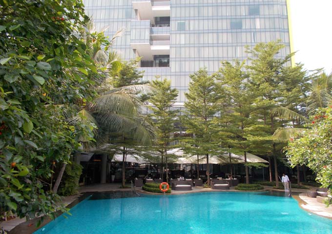Bali-style pool with swim-up bar at luxurious DoubleTree by Hilton