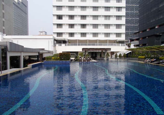 Shaded pool with kids' splash area at Pullman Jakarta