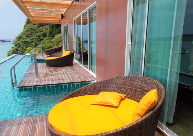 Shared pools of multi-level pool villas offer fantastic sea views