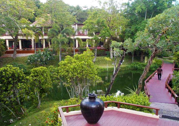 Pond, garden and rooms at elegant Avani+ Lanta Resort