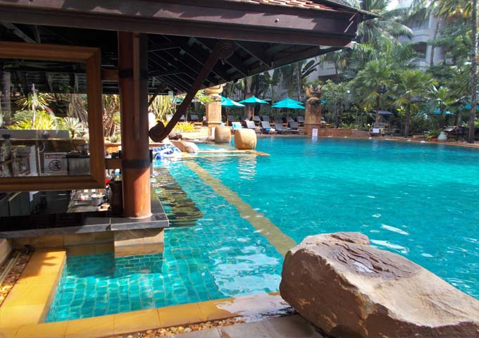 Tropical gardens and enticing pool at AVANI Resort