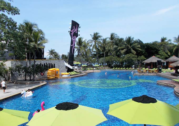 Large lagoon-shaped pool at family-friendly Hard Rock Hotel