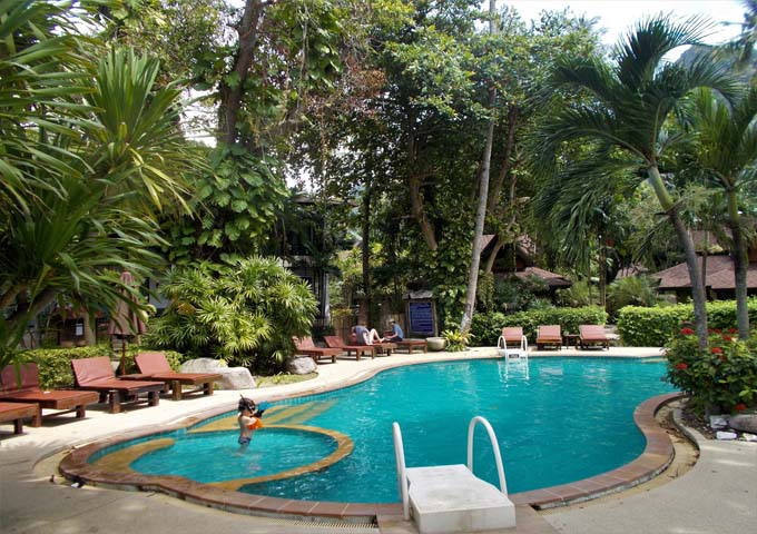 Pool in a tropical setting at small but pleasant Sunrise Tropical Resort