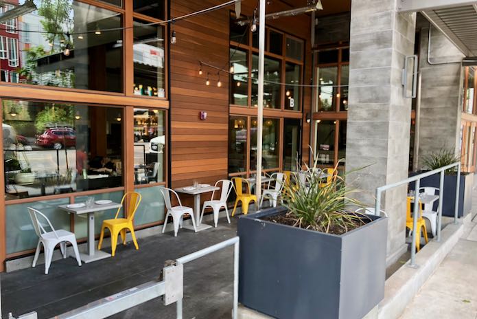 Outdoor seating and patio at Super Bueno Mexican restaurant.