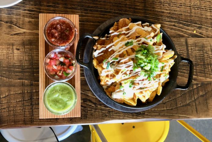 Nachos and salsa at Super Bueno.