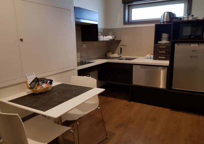 Apartments feature a fully-equipped kitchen.