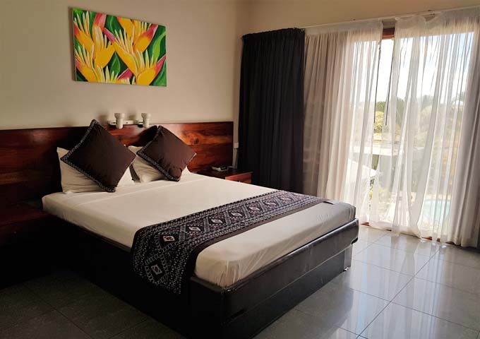 Deluxe Rooms are colourful and comfortable.