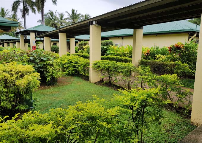 Room and villas are accessible through lovely gardens.