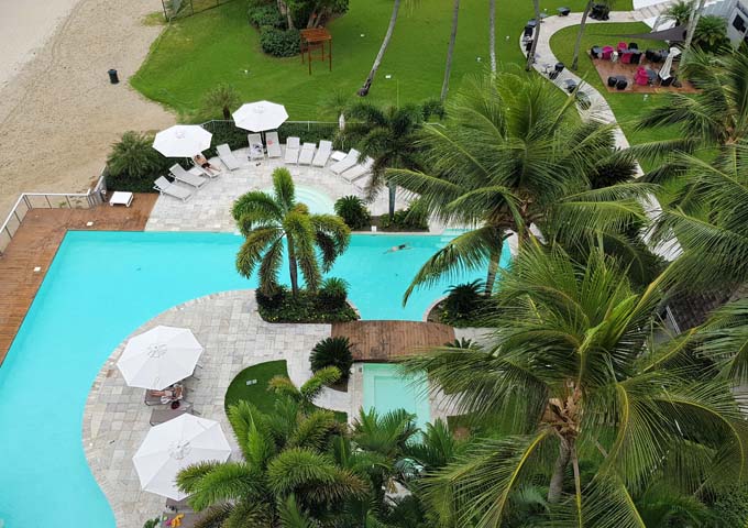The attractive pool is surrounded by lush gardens.