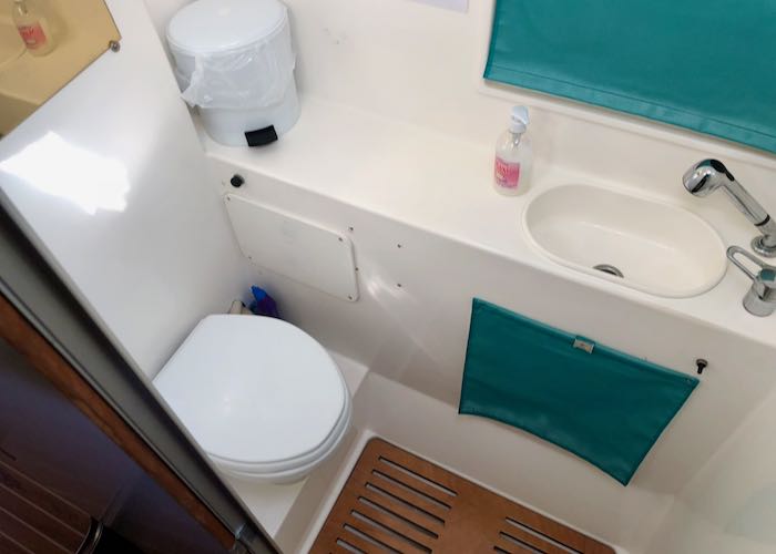 Toilets onboard Santorini boat tours. 