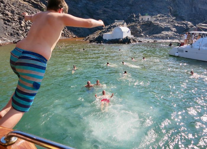 Hot springs boat tour in Santorini.