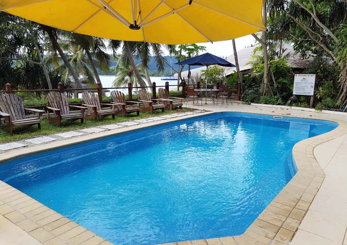 Pool with water views at family-friendly Hideaway Island Resort.