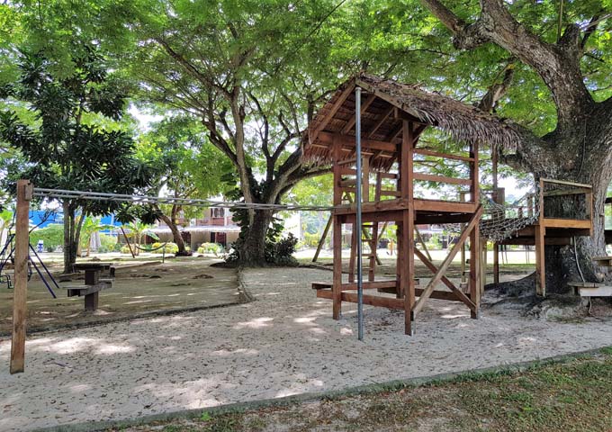 The playground is small but shaded.