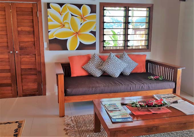The lounge area is larger villas is comfortable and colourful.