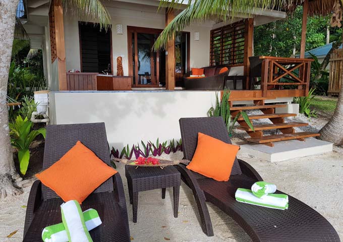 Private lounge chairs outside villas give fantastic sea views.
