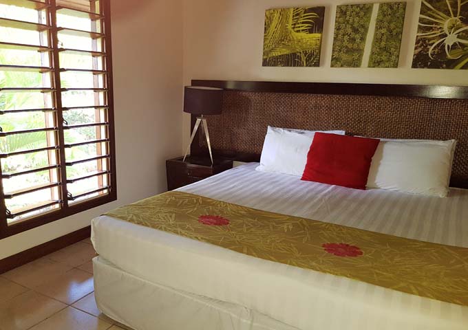 The bright Villa bedrooms feature traditional arts.