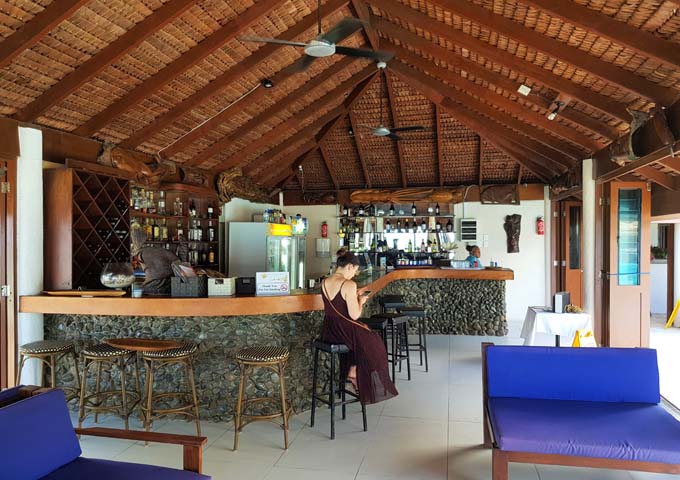 Salt Bar at Breakas resort has a stylish stone and wood bar.