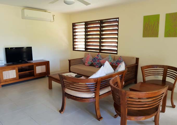 The apartments feature simple but spacious living areas.