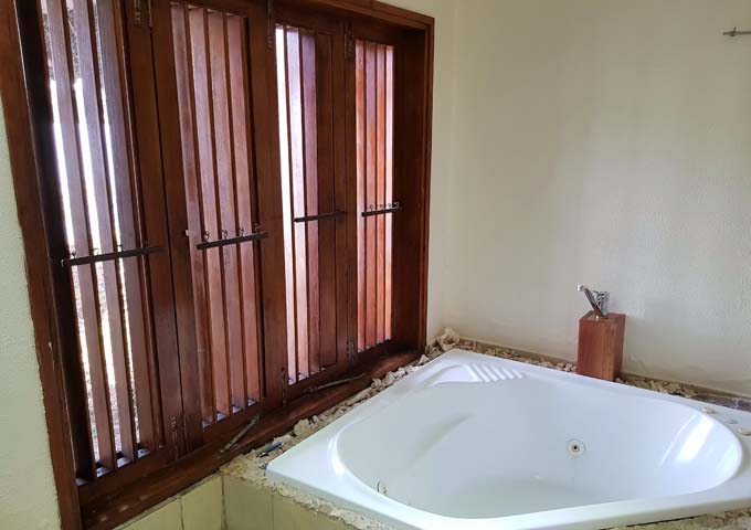 The charming chalet bathroom has a spa.