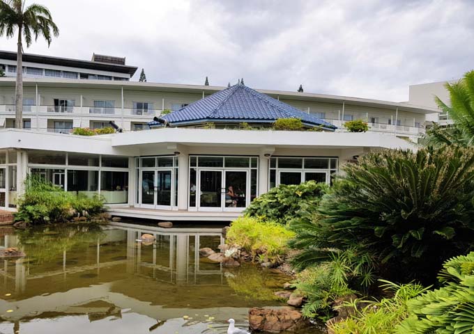 The hotel is surrounded by tropical gardens and ponds.