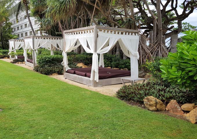 The gardens feature luxurious cabanas.