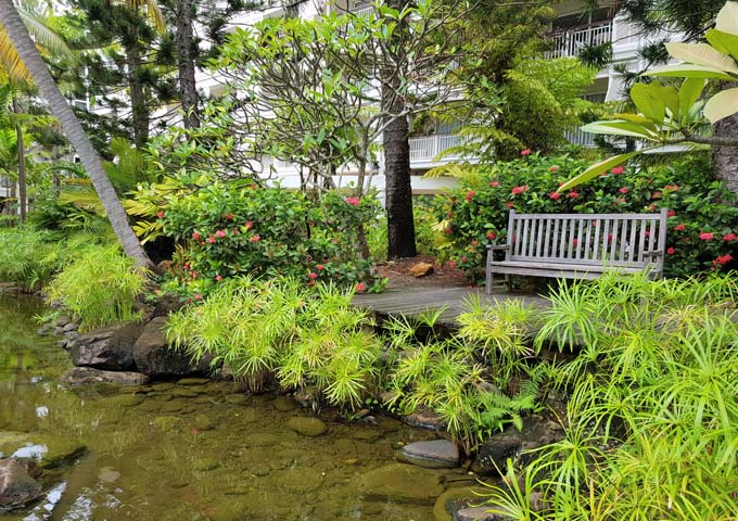 The resort has fish ponds among tropical gardens.