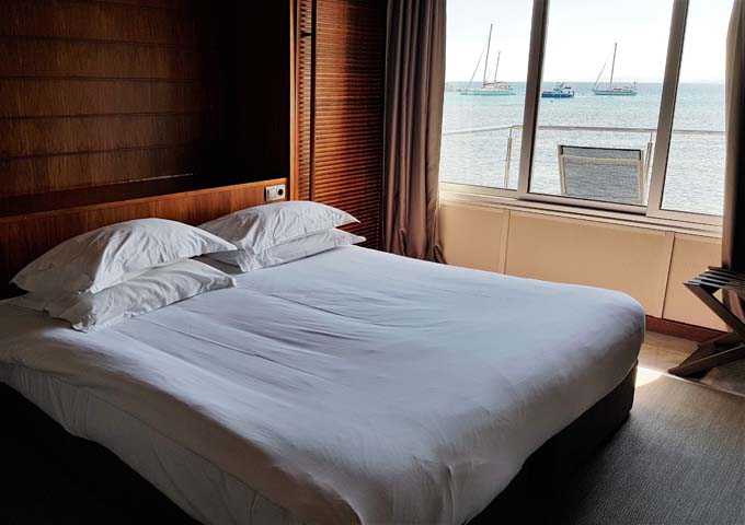 Overwater Bungalow bedrooms are plain but afford nice views.