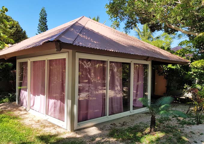 The window walls of Garden Bungalows hamper privacy.