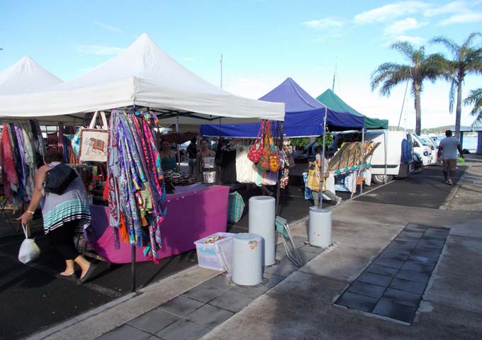 Stalls near the market sell clothes and souvenirs.