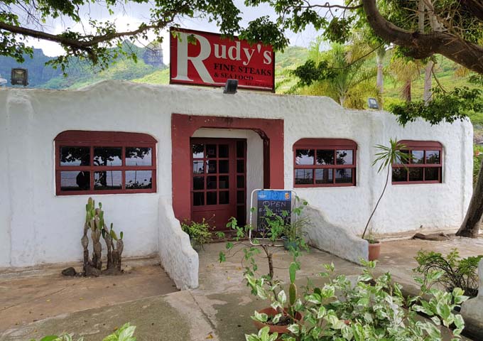 Rudy's specializes in steaks and seafood.