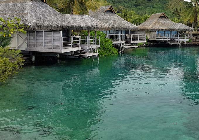 The Beach Bungalow sundecks lead to tranquil waters.