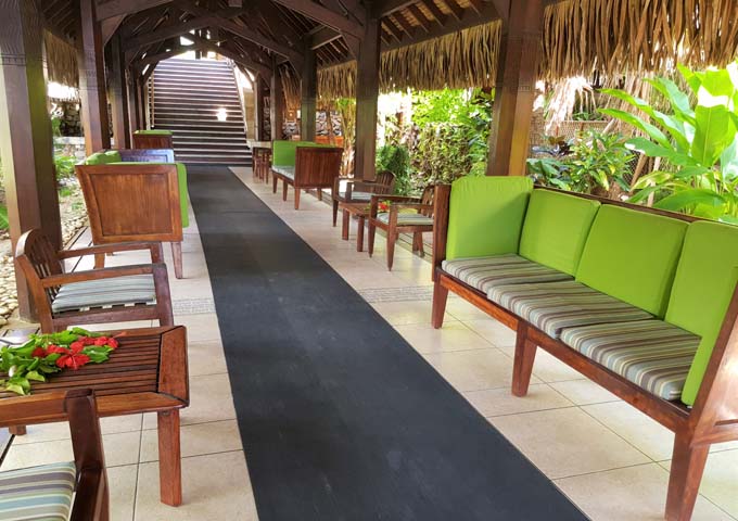 A colourful corridor connects the lobby with the bungalows.