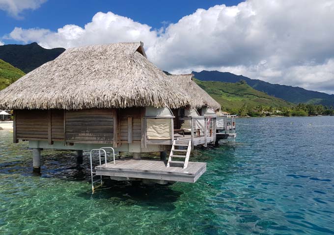 Some Overwater Bungalows are clustered together.