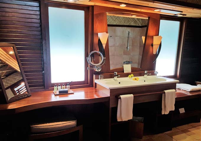 The overwater bungalow bathrooms are very appealing.