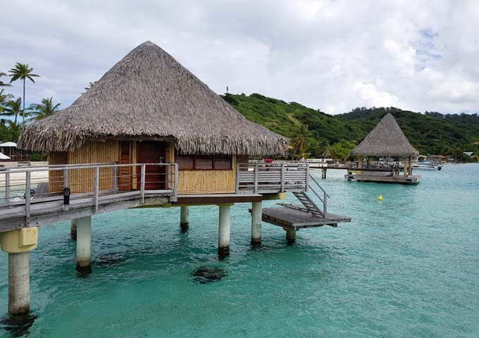 Overwater bungalows feature private sundecks that lead to the lagoon.