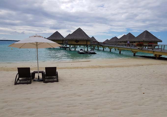 Overwater bungalows are accessible using raised walkways.