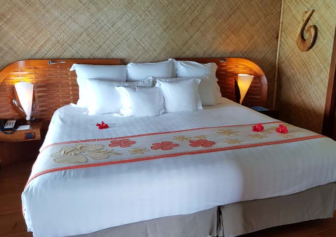 The accommodations feature a modern decor with Polynesian touches.