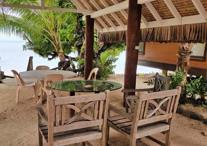 Beachside seating is popular for eating and drinking.