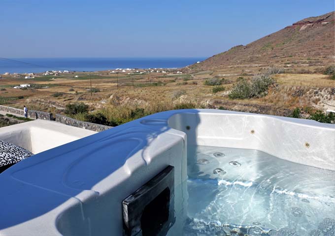 The villa terrace has a jacuzzi with amazing sea views.